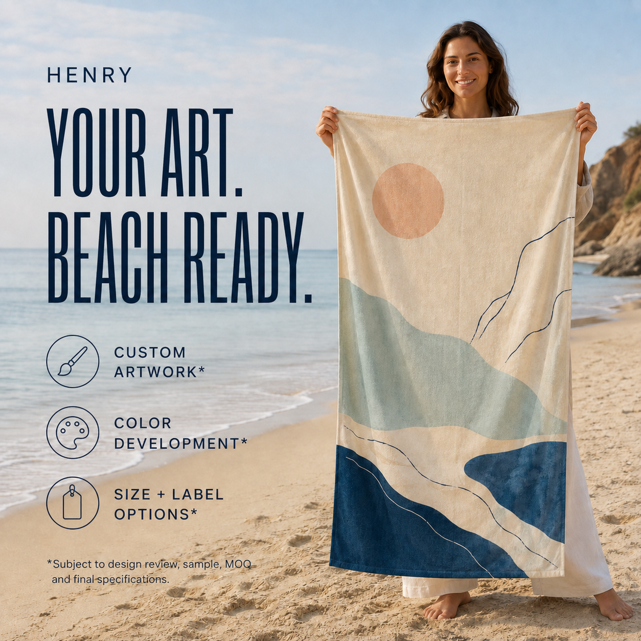 A person holding a custom printed beach towel with cream-and-blue wave artwork on a beach.